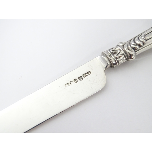 238 - A Victorian silver cake knife hallmarked Birmingham 1856, maker Hilliard & Thomason. Approx. 8 1/4