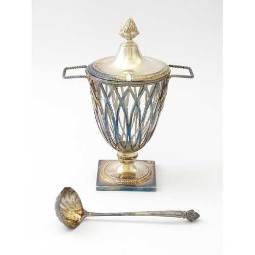 241 - A Victorian silver twin handled preserve pot and cover of pierced pedestal form with clear glass lin... 