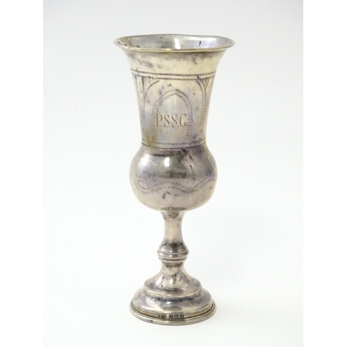 243 - A silver kiddush cup with engraved decoration, hallmarked Birmingham 1939, maker Moses Salkind & Co.... 