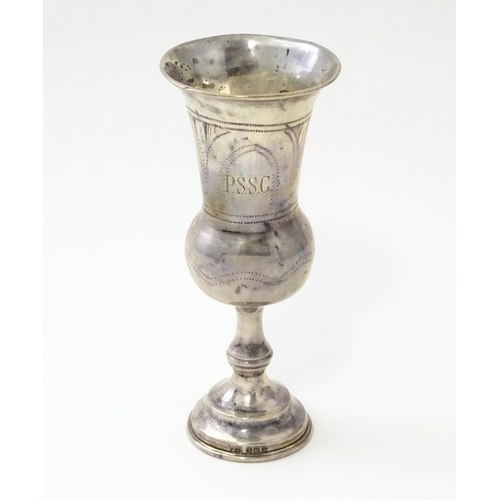 243 - A silver kiddush cup with engraved decoration, hallmarked Birmingham 1939, maker Moses Salkind & Co.... 