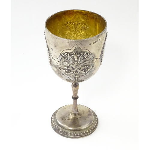 249 - A Victorian silver goblet of chalice form with beaded and acanthus detail and gilded interior, hallm... 