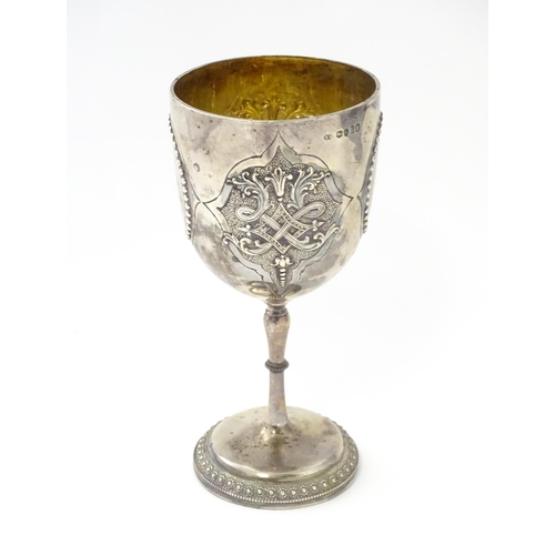 249 - A Victorian silver goblet of chalice form with beaded and acanthus detail and gilded interior, hallm... 