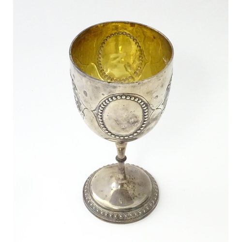 249 - A Victorian silver goblet of chalice form with beaded and acanthus detail and gilded interior, hallm... 