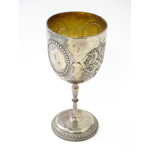 249 - A Victorian silver goblet of chalice form with beaded and acanthus detail and gilded interior, hallm... 