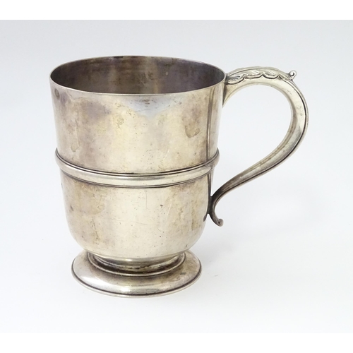 250 - A silver tankard with banded detail hallmarked Birmingham 1938, Henry Pidduck & Sons. Approx. 5