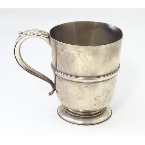 250 - A silver tankard with banded detail hallmarked Birmingham 1938, Henry Pidduck & Sons. Approx. 5