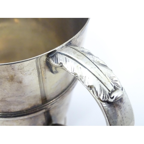 250 - A silver tankard with banded detail hallmarked Birmingham 1938, Henry Pidduck & Sons. Approx. 5