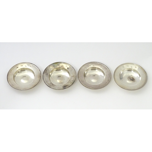 261 - A set of four silver pin dishes formed as miniature Armada dishes, hallmarked London 1961, maker Gar... 