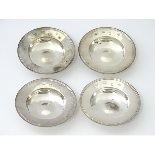 261 - A set of four silver pin dishes formed as miniature Armada dishes, hallmarked London 1961, maker Gar... 