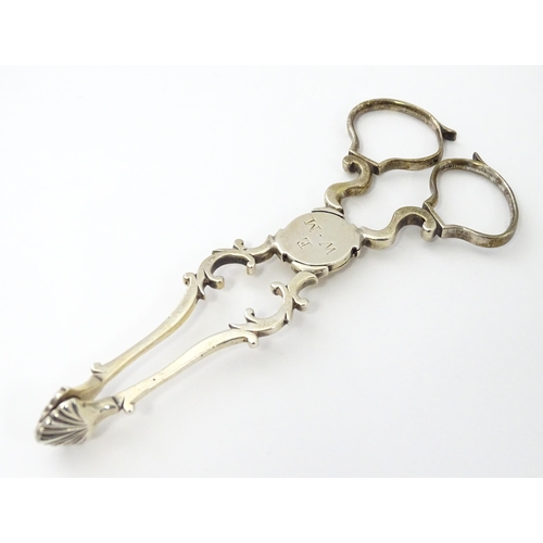 271 - Geo III silver sugar tongs with bright cut decoration, London c1778 maker Hester Bateman. Together w... 