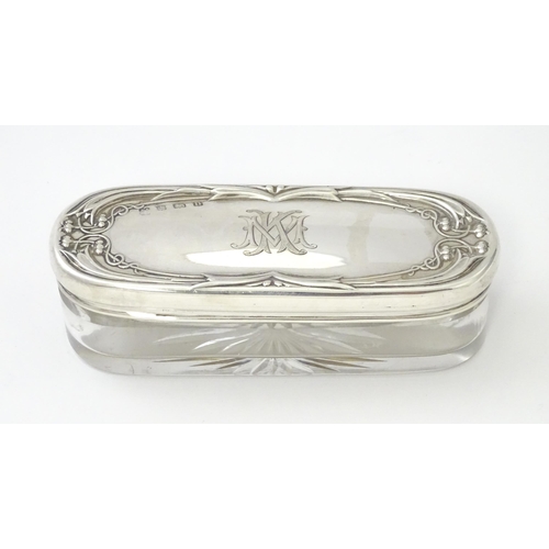 285 - A glass dressing table pot with silver top hallmarked Birmingham 1912, maker Martin Hall & Co Ltd . ... 