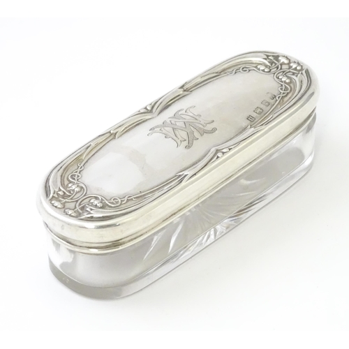 285 - A glass dressing table pot with silver top hallmarked Birmingham 1912, maker Martin Hall & Co Ltd . ... 