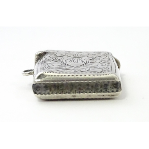 288 - A silver vesta case with engraved decoration, hallmarked Birmingham 1912, maker John Rose. Approx. 1... 