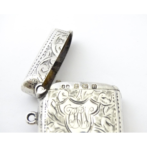 288 - A silver vesta case with engraved decoration, hallmarked Birmingham 1912, maker John Rose. Approx. 1... 