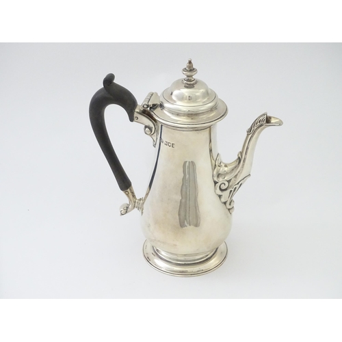 309 - A silver coffee pot hallmarked London 1906 maker Harrison Brothers & Howson. Approx 8