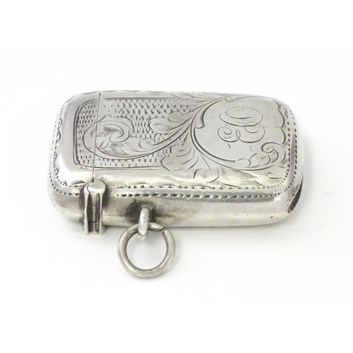 311 - A silver vesta case with engraved decoration, hallmarked Birmingham 1908, maker William Hair Haseler... 