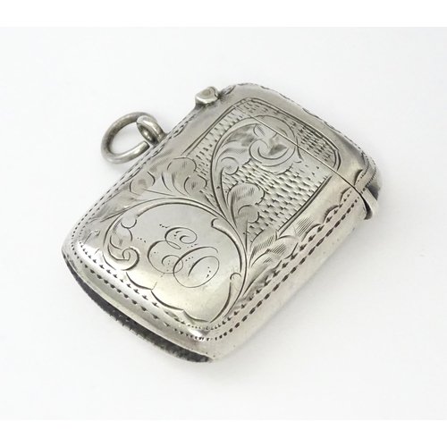 311 - A silver vesta case with engraved decoration, hallmarked Birmingham 1908, maker William Hair Haseler... 