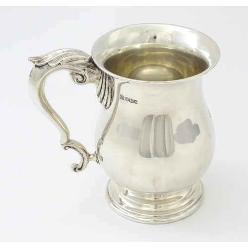 326 - A silver tankard hallmarked Sheffield 1933 maker James Deakin & Sons. Approx 5 1/4