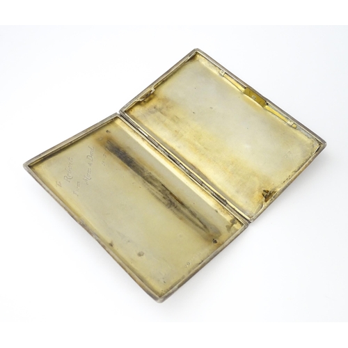 333 - An Art Deco silver cigarette case with gilded interior, hallmarked Birmingham 1931, maker Frederick ... 