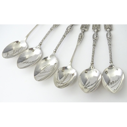 351 - Six French silver souvenir teaspoons, the handles with terminals formed as various town crests, the ... 