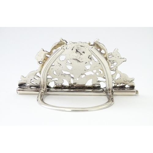 353 - A Victorian silver menu holder /  table place card holder with scrolling detail. Hallmarked Chester ... 