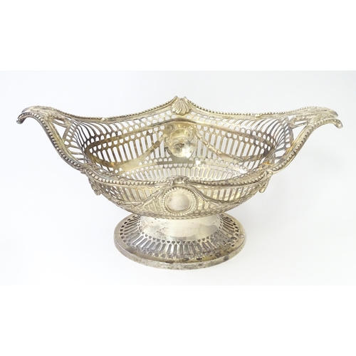 450 - A Victorian silver pedestal dish / basket with pierced decoration and swag and acanthus detail, hall... 