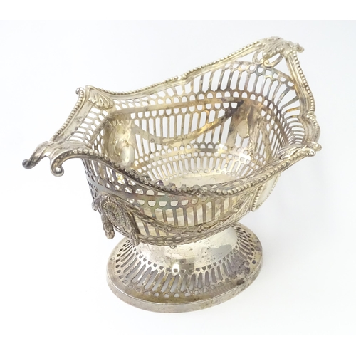 450 - A Victorian silver pedestal dish / basket with pierced decoration and swag and acanthus detail, hall... 