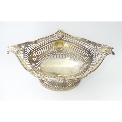 450 - A Victorian silver pedestal dish / basket with pierced decoration and swag and acanthus detail, hall... 