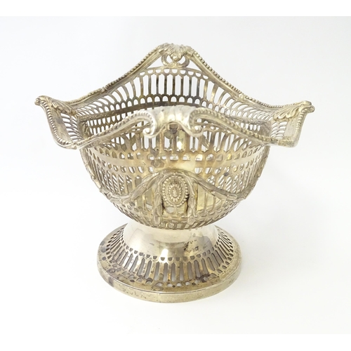 450 - A Victorian silver pedestal dish / basket with pierced decoration and swag and acanthus detail, hall... 