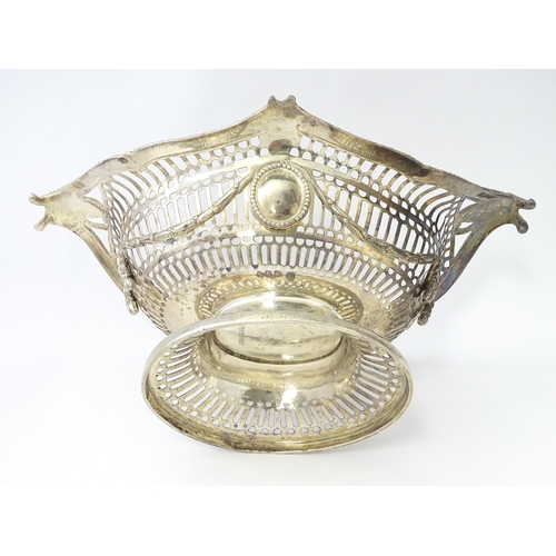 450 - A Victorian silver pedestal dish / basket with pierced decoration and swag and acanthus detail, hall... 