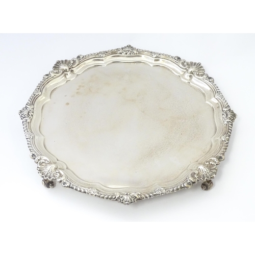 455 - A silver salver hallmarked London 1926, maker Goldsmiths & Silversmiths Co. Ltd. Approx. 13 1/4