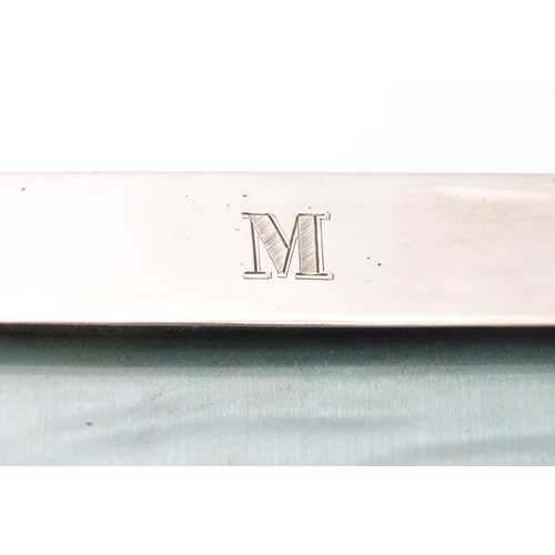 482 - A photograph frame with silver plate surround, engraved with letter M, and dated 16-4-16. Approx. 6 ... 