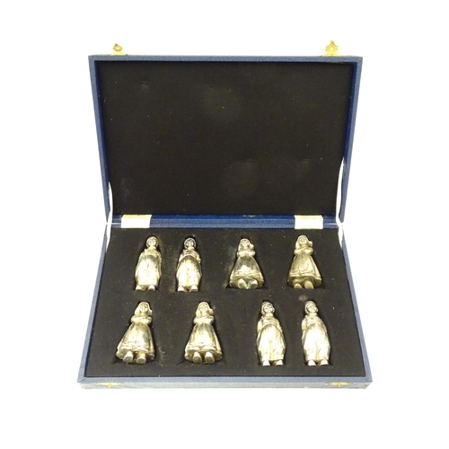 487 - A cased set of eight Continental .925 silver novelty pepperettes formed as children, by Neresheimer ... 