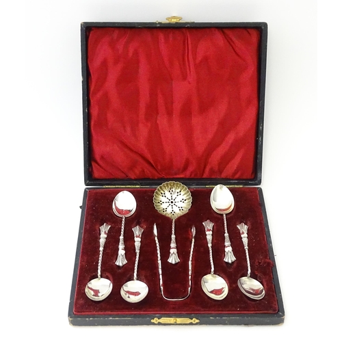 500 - A cased set of six silver teaspoons with tongs and sifter spoon en suite, hallmarked Birmingham 1904... 