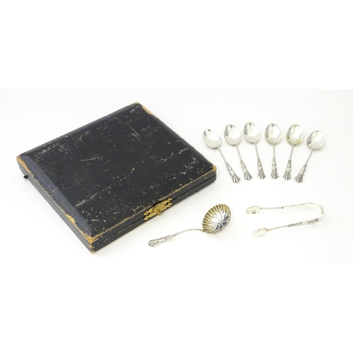 500 - A cased set of six silver teaspoons with tongs and sifter spoon en suite, hallmarked Birmingham 1904... 