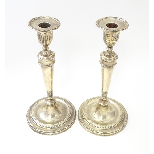 457 - A pair of silver candlesticks hallmarked Sheffield 1971, maker Hawksworth, Eyre & Co Ltd. Approx. 10... 