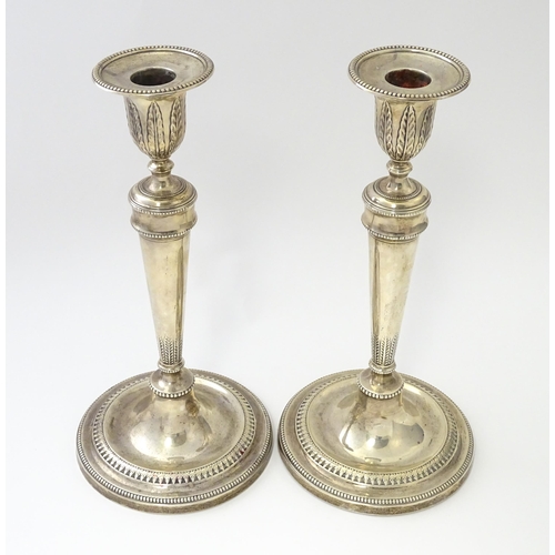 457 - A pair of silver candlesticks hallmarked Sheffield 1971, maker Hawksworth, Eyre & Co Ltd. Approx. 10... 