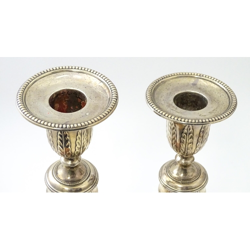 457 - A pair of silver candlesticks hallmarked Sheffield 1971, maker Hawksworth, Eyre & Co Ltd. Approx. 10... 