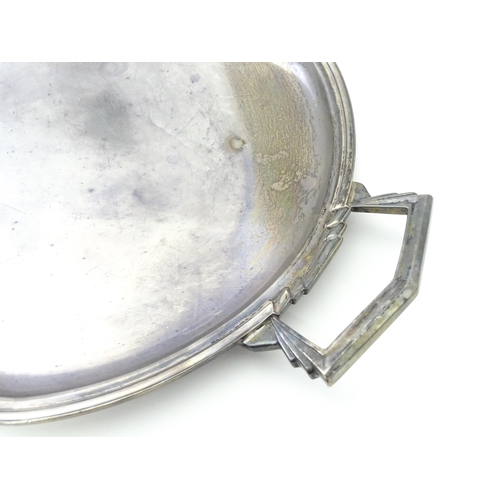 458 - An Art Deco silver twin handle tray of oval form, hallmarked Sheffield 1936, maker Mappin & Webb Ltd... 