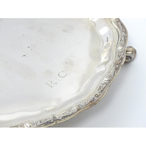 465 - A silver card tray hallmarked Birmingham 1964, maker Garrard & Co. Ltd. Approx. 6 1/4