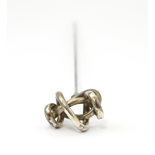 653 - Two hat pins, one surmounted by early 20thC silver detail maker Gourdel Vales & Co, the other surmou... 