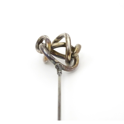 653 - Two hat pins, one surmounted by early 20thC silver detail maker Gourdel Vales & Co, the other surmou... 