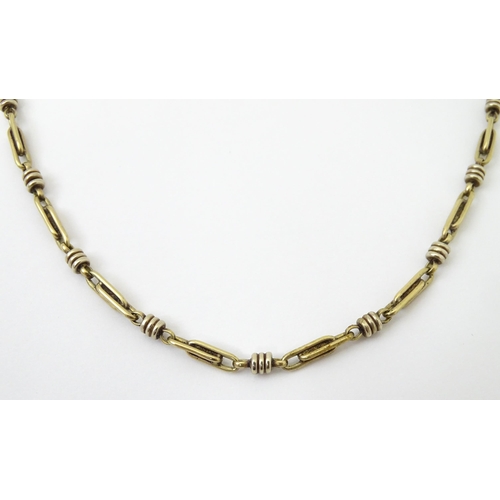 654 - A silver and silver gilt necklace. Approx. 20