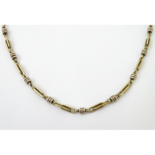 654 - A silver and silver gilt necklace. Approx. 20