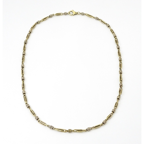 654 - A silver and silver gilt necklace. Approx. 20