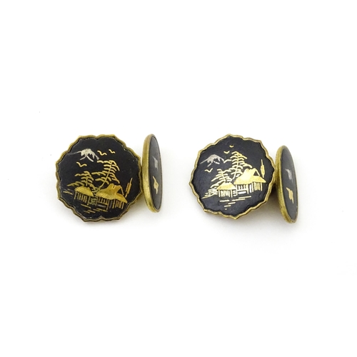 664 - Gilt metal cufflinks, tie pin and clip with Japanese Damascene decoration. Tie pin approx. 2