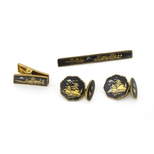 664 - Gilt metal cufflinks, tie pin and clip with Japanese Damascene decoration. Tie pin approx. 2