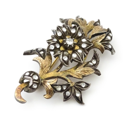 671 - A Victorian brooch of floral sprig form set with white stones Approx 2 1/2