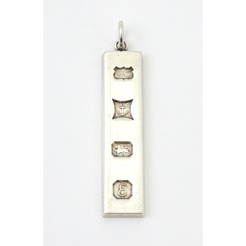 674 - A silver pendant of ingot form, hallmarked Birmingham 197.  Approx. 1 3/4