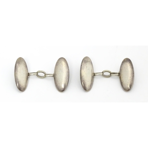 701 - A pair of silver cufflinks hallmarked Chester 1895 maker Charles Horner.